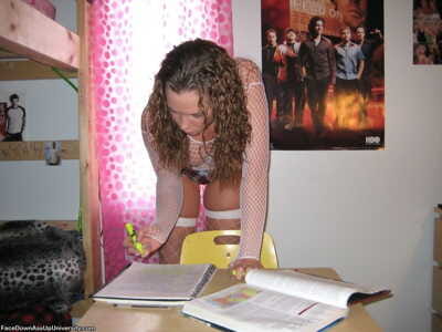 Adolescent youthful does her homework in gaze at thru mesh Master and underwear with fishnets