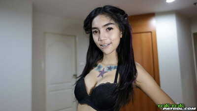 Adolescent Thai model with tattoos gives up her curly gentile to a Farang