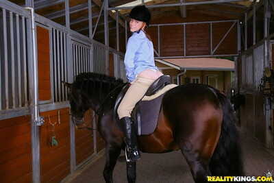 Passionate teen amateur equestrian Ryann attains group-bonked from behind by the stable hand