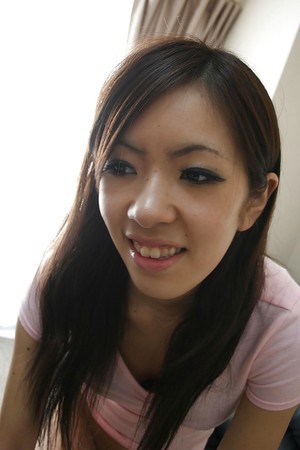 Oriental amateur Harumi Matsuda undressing and exposing her honey pot