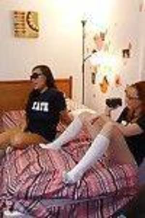 Hot coeds in sunglasses stripping and having girl-on-girl having benefit from in the dorm room