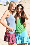 Young pretties Dana and Lisa take the exposed modelling plunge mutually on beach dune