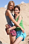 Young pretties Dana and Lisa take the exposed modelling plunge mutually on beach dune