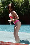 Leggy youthful queen Kylie Quinn undresses off panties and bikini outdoors by pool