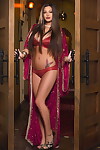 Deviant dark brown model Chelsie Aryn standing in her hot red sexy pants