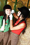 Perspired lesbian chicks Lucy Lee & Angelica playing with a sex toy in the mount barn