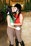 Perspired lesbian chicks Lucy Lee & Angelica playing with a sex toy in the mount barn