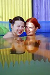 Exclusively legal babes Britt E and Anita E have fun with their cages of love underwater