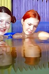 Exclusively legal babes Britt E and Anita E have fun with their cages of love underwater