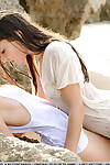 Girl-on-girl teenies Lucia D & Ryanel A showing sodden skinhead love-cage & stripped apple bottoms on beach