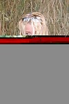 Moist blond princess Nellie masturbates with her fingers in the haystack