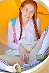 Youthful redhead in pigtails flashes cunt at the playground & toys in socks