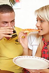 Juvenile golden-haired doll shares a pizza prior to getting screwed by her fellow partner
