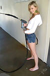 Blond youthful Kasia skates jeans over her belt overspread butt at the car wash