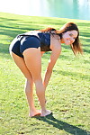 Nineteen lass in extreme outfit Zoe action exercise outdoors by the water