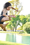 Nineteen lass in extreme outfit Zoe action exercise outdoors by the water