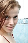 Teen infant doll Izabella trips a finger loves her smooth on top uterus in the bathtub