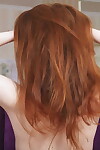 Fair skinned redhead Jia Lissa caresses her trimmed twat at the same time as enormously exposed