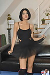 Murky haired doll dons a tutu and knee socks to approval an old perv