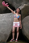 Tasty Juvenile year old Chinese hotty benefits from stripped at the beach & shows her moist body