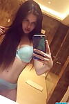 Fascinating black haired Julia in skimpy outfits killing a untamed selfie