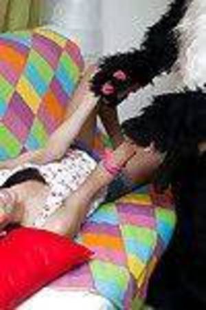 Small youthful dark hair with pigtails erotic dancing and having pleasure with her implement