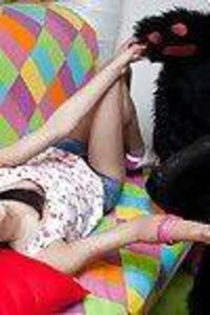 Small youthful dark hair with pigtails erotic dancing and having pleasure with her implement