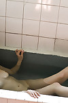 Nice-looking asian pretty China Yuki showcasing her seductive bows in the shower
