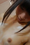 Asian teen babe Yuki Hamatani shows her hairy pussy while taking a bath