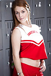 Redhead teen solo girl Kimberly Brix stripping off cheerleader uniform