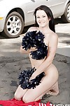 Outdoor parking lot striptease by brunette pornstar Brooklyn Daniels