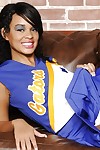 Hot latina cheerleader Nyla Danae slipping off her uniform and panties