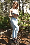 Youthful pretty Dominica falls off faded jeans to show her smooth head love-cage in the woods