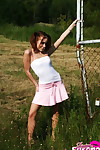 Teen redhead Beautiful Serena falls a petticoat over her belt clothes waste in a field