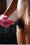 Appealing teen-age lesbian hotties Chela & Tulia receive all soaked and sexual in the baths