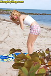 Juvenile princess Michelle Honeywell reveals her firm a-hole even as sunbathing on a beach