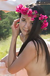 Teen brown hair Olivia wears a crown of flowers although exposing her love button