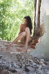 Desire haired teeny stunner posing wazoo uncovered in abandoned place