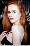 Clammy redhead Bella Milano showcases her smooth cage of love not featured garments on
