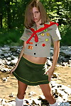 Nasty amateur doll teases next to a stream in her Angel Guides uniform