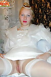 Teen looking model with red lips dons MILFs wedding costume for vibrator activity