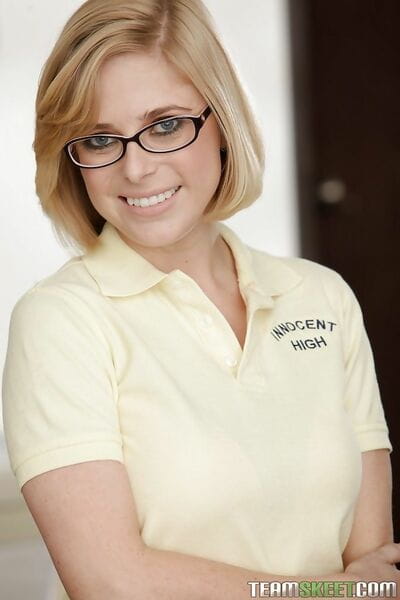 Cute schoolgirl Penny Pax is posing in her extreme glasses