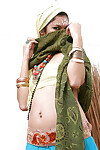 Perfectly dressed Indian female Yesica uncovering her forbidden face