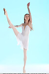 Supple dancer Annett A removes tube & white short skirt to show insignificant love melons