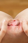 Usual redhead Carinela amplifying legs for finger smokin\' of bald vagina