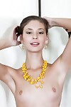 Gorgeous young Irina J into she\'s in mirror wearing simply yellow tube