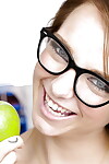 Smiley schoolgirl in glasses with miniscule body benefits from in nature\'s garb in the classroom