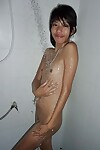 Thai teenager Dow wetting her flat chest and rigid adult baby waste in bathroom