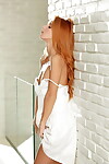 Accustomed redhead wench drops her white clothing to show off her skinhead gentile