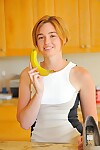 Physical short-haired looker uses a banana to fuck her tacky cunt
